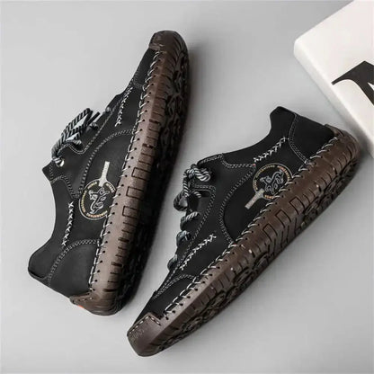 Elegant men's ankle boots by Jungle Line with anti-slip lacing leopard print, featuring stylish design and sturdy sole.