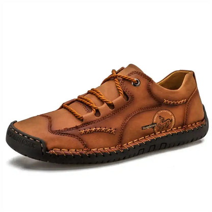 Elegant men's ankle boots by Jungle Line featuring leopard print, lacing, and anti-slip sole for stylish safety.