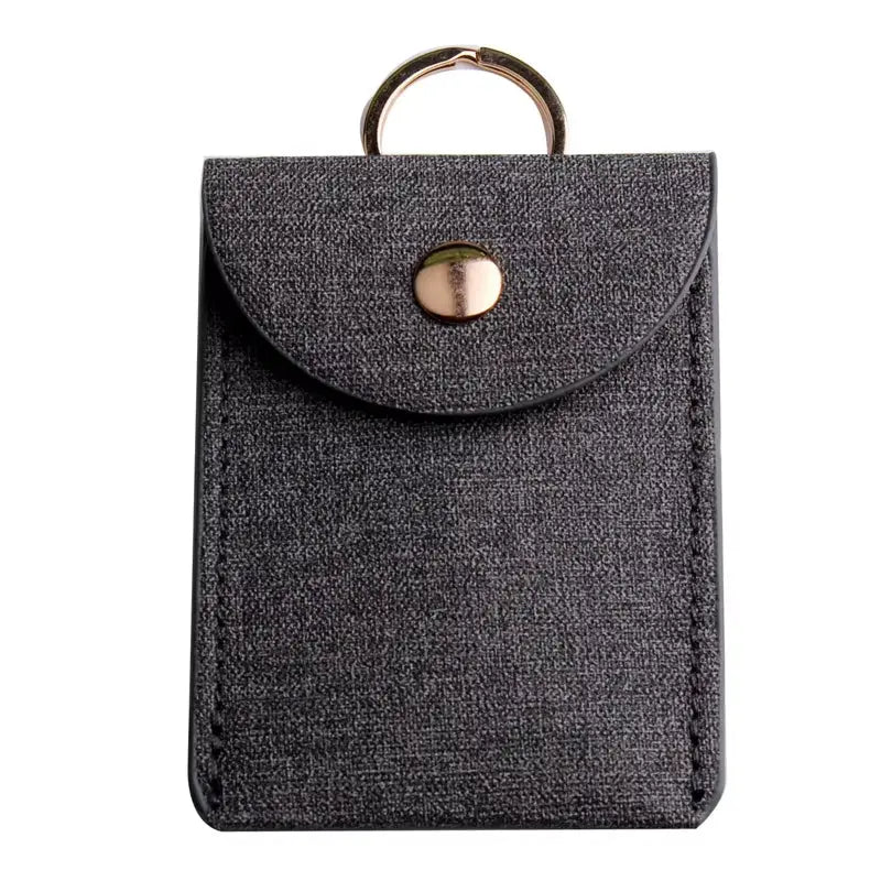 Portefeuille en PU à imprimé léopard avec porte-clés de la marque Jungle Line, style tendance et pratique.