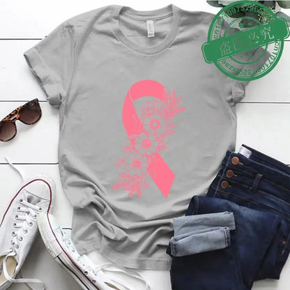 Pink floral Breast Cancer Awareness T-shirt by Jungle Line featuring a pink ribbon design for supporting cancer fighters and survivors.
