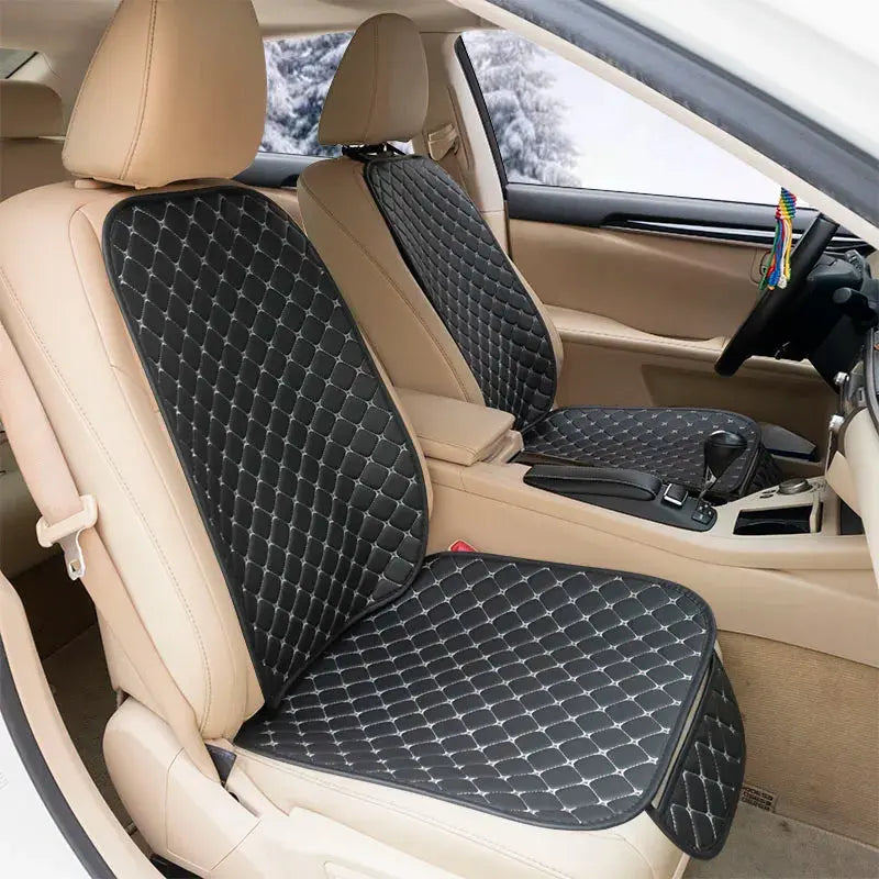 Black leather Jungle Line four-season car seat covers for front and rear seats, designed for comfort and protection.