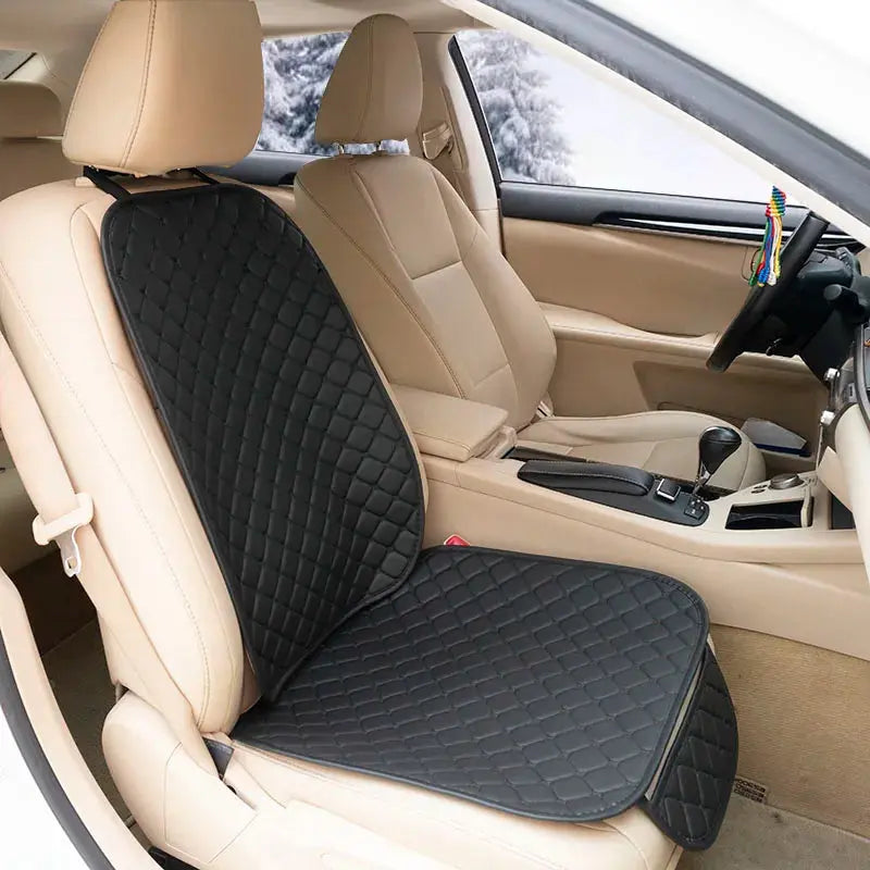 Black leather car seat covers by Jungle Line, suitable for front and rear seats, designed for four-season comfort and protection.