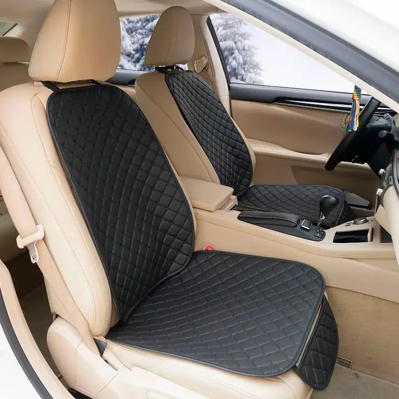 Black leather Jungle Line four seasons car seat covers for front and rear seats, designed for comfort and protection.