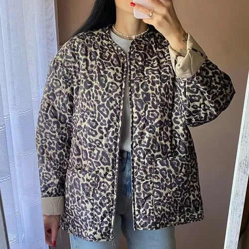 Lightweight quilted jacket for women by Jungle Line in leopard print, padded for warmth, perfect for autumn and winter outerwear.
