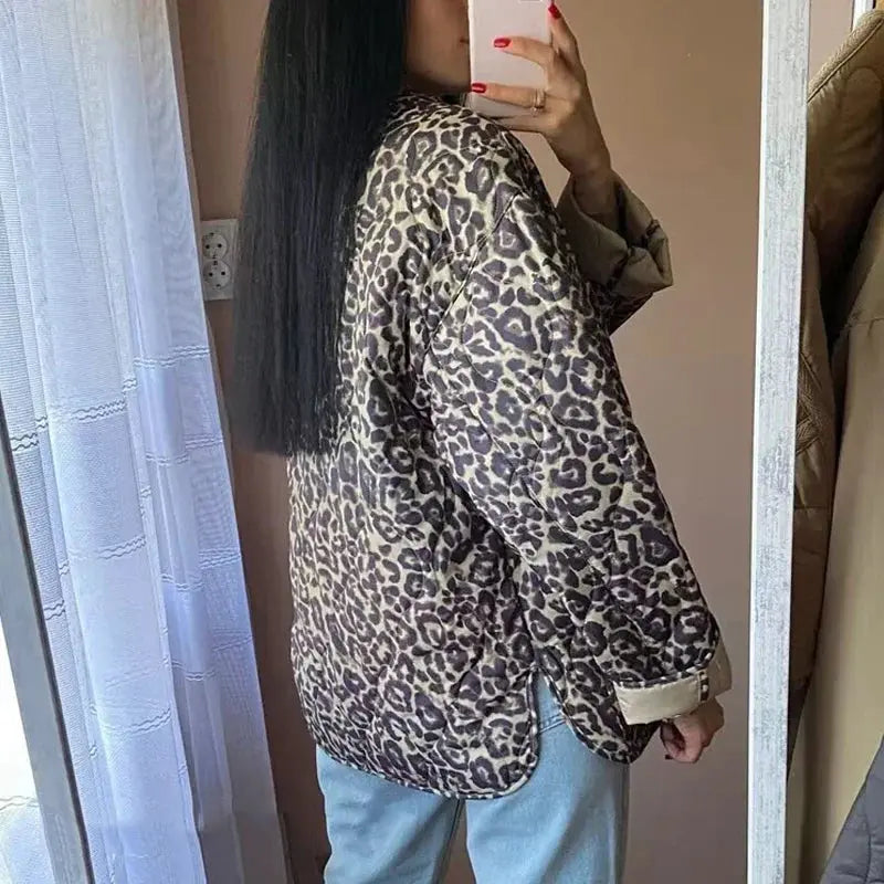 Lightweight quilted padded jacket for women by Jungle Line, with a leopard print design, suitable for autumn and winter outerwear.