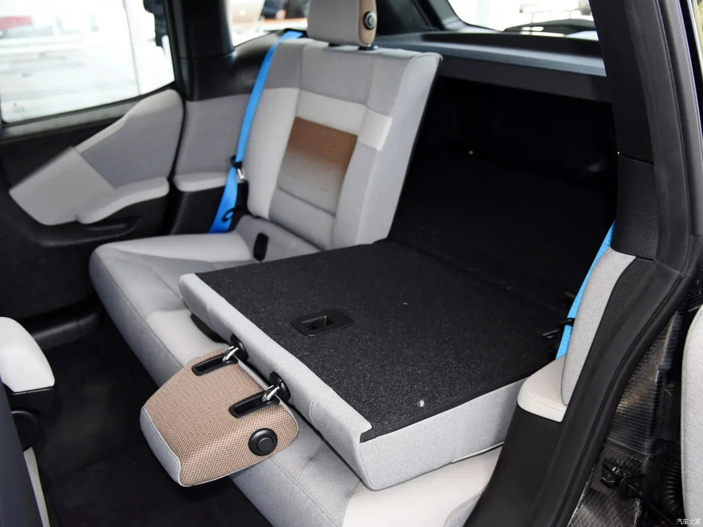 Full set of Jungle Line custom fitted faux leather car seat covers, showing black and beige upholstery for front and back seats.