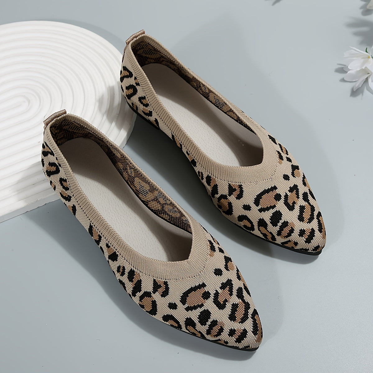 Women's leopard print flat shoes by Jungle Line with pointed toe slip-on design and lightweight casual style.