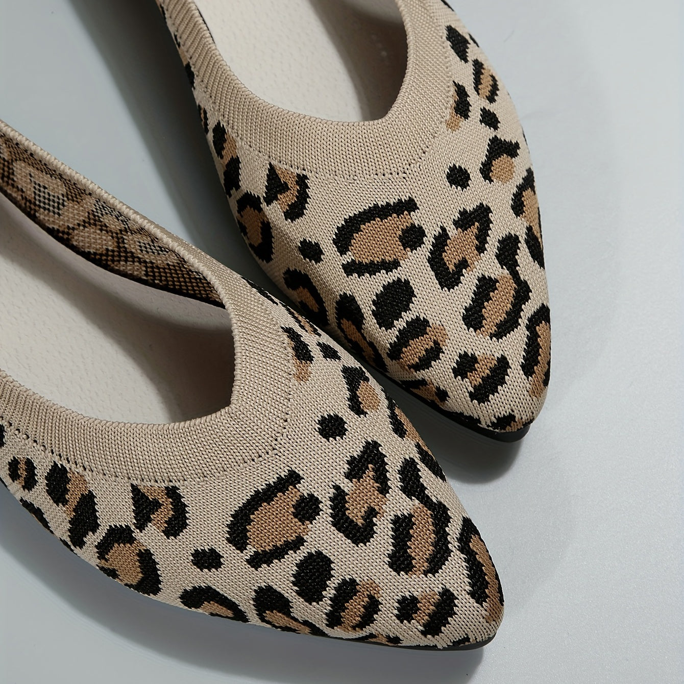 Women's leopard print flat shoes by Jungle Line with pointed toe, slip-on casual style, lightweight and comfortable for everyday wear.