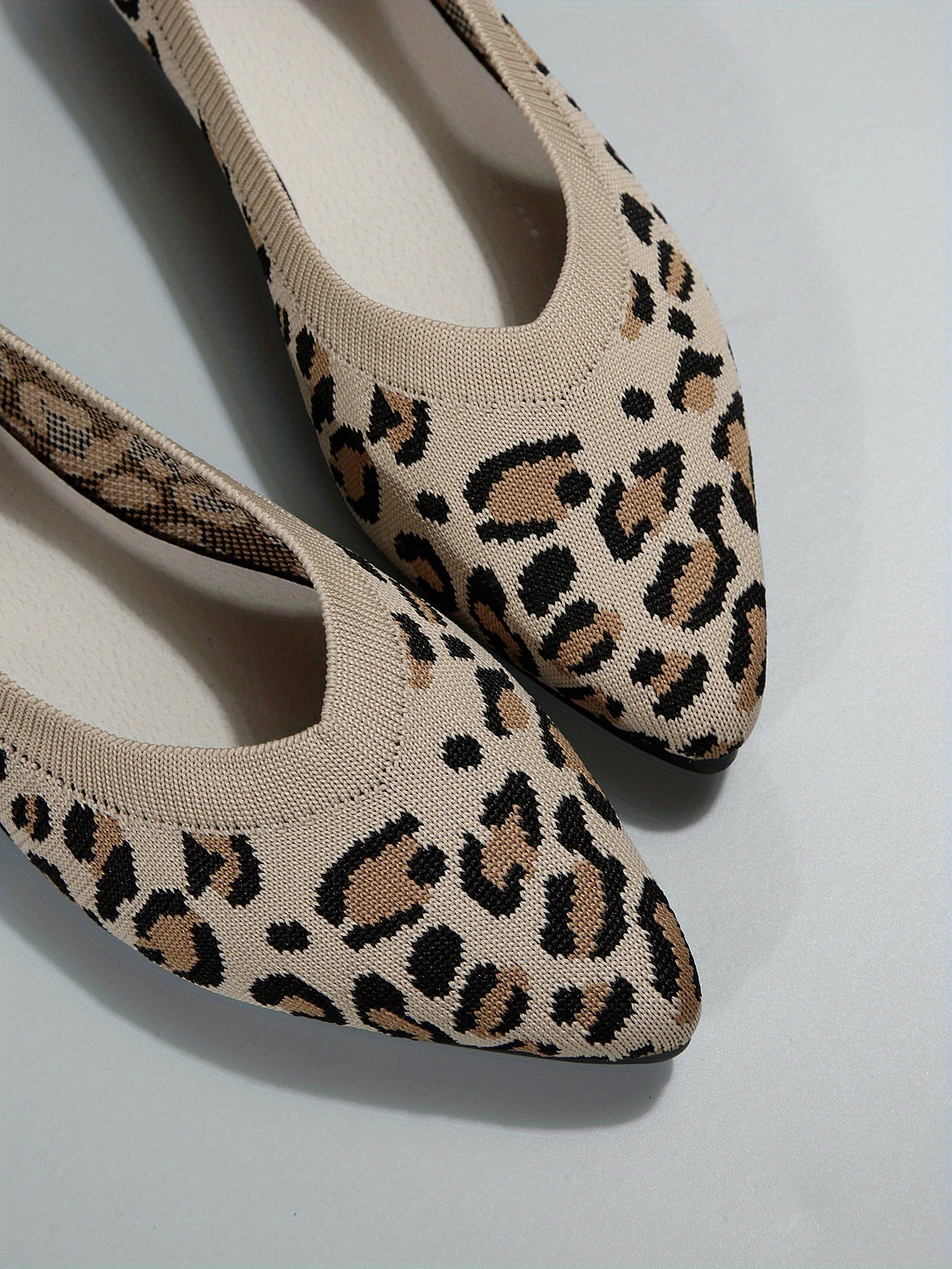 Women's leopard print flat shoes by Jungle Line featuring pointed toe, slip-on design, lightweight casual style.