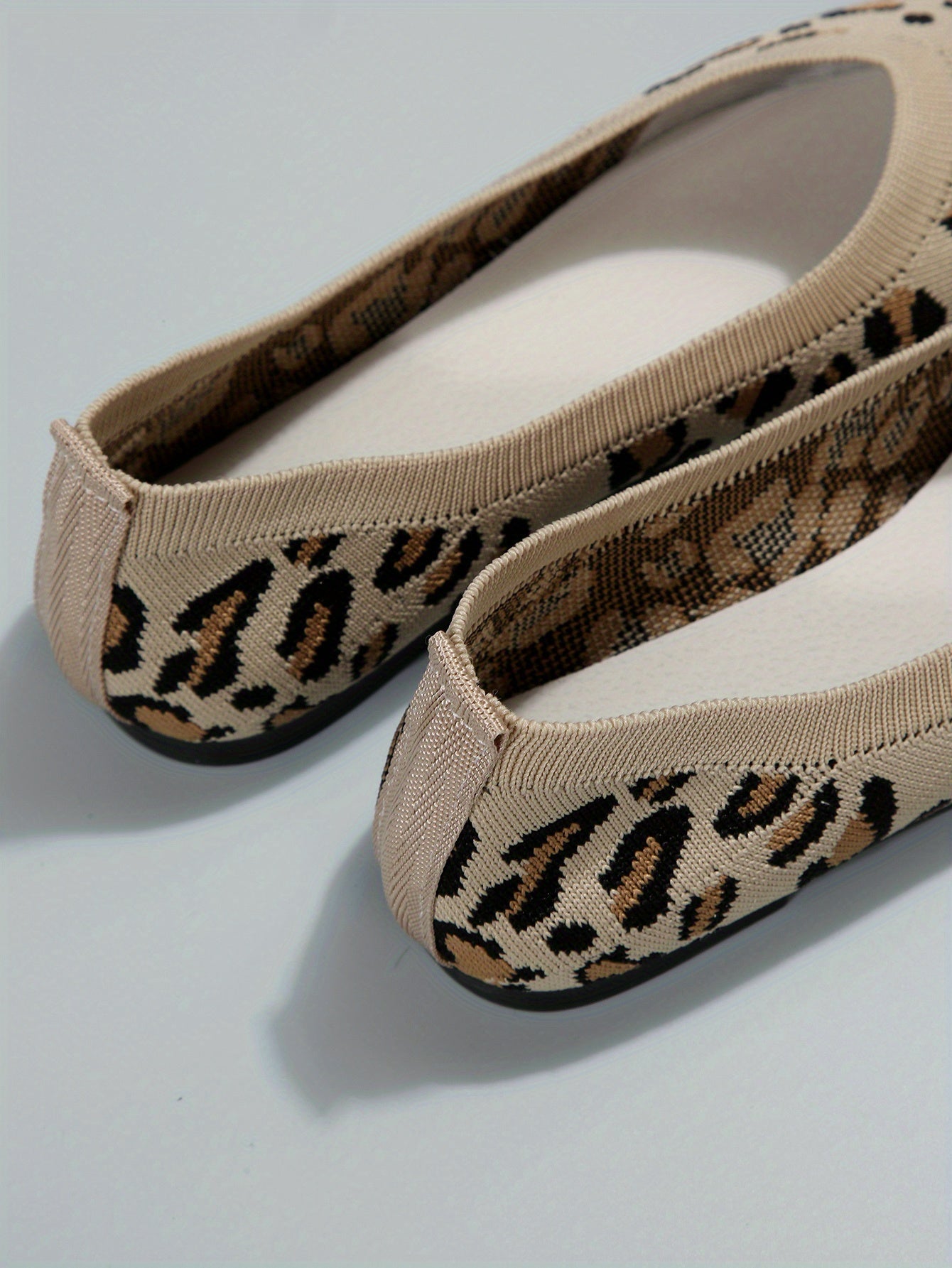 Women's leopard print flat shoes by Jungle Line with pointed toe, slip-on design and lightweight, casual style.