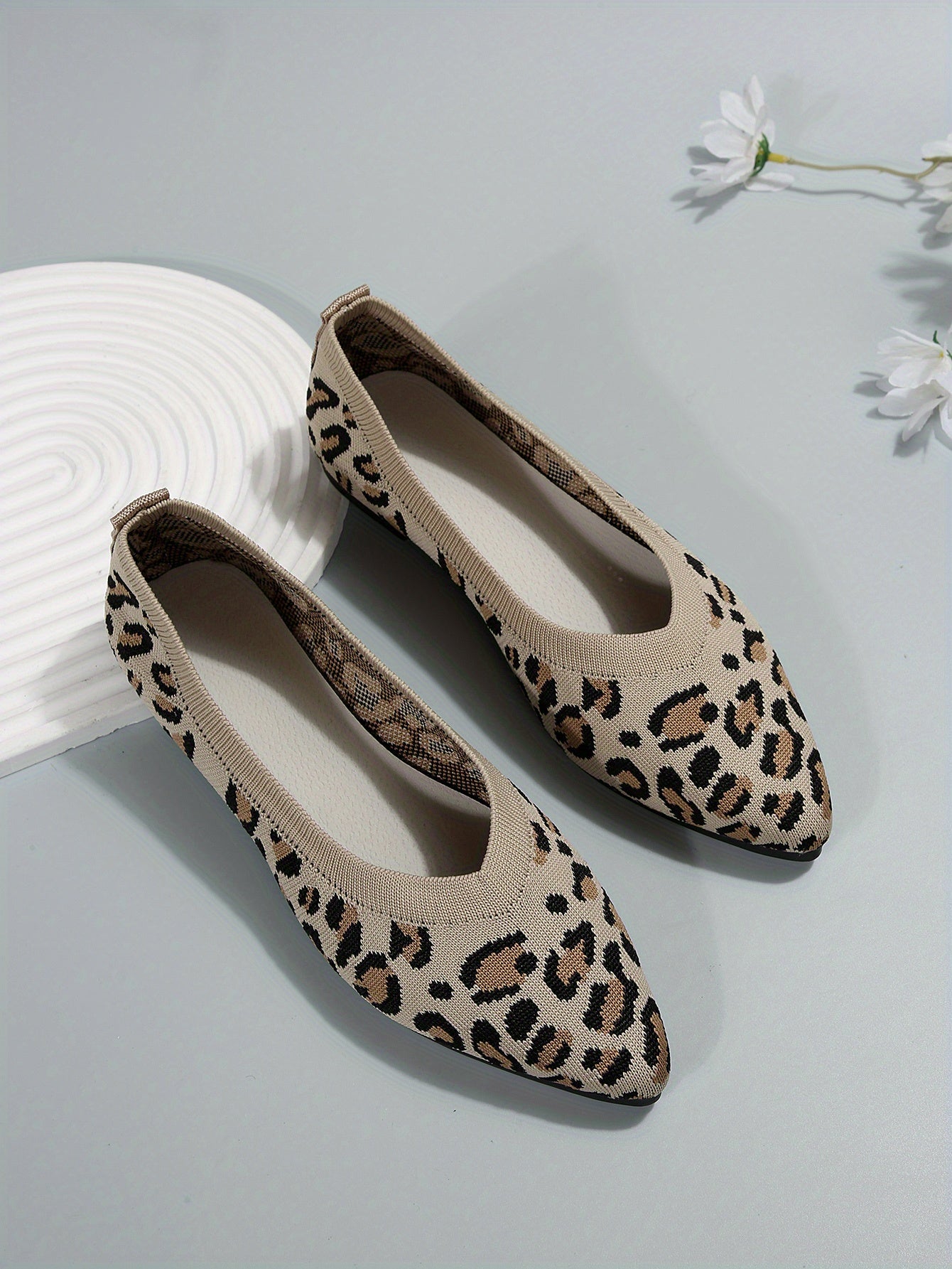 Women's leopard print flat shoes by Jungle Line with pointed toe slip-on design and lightweight casual style.