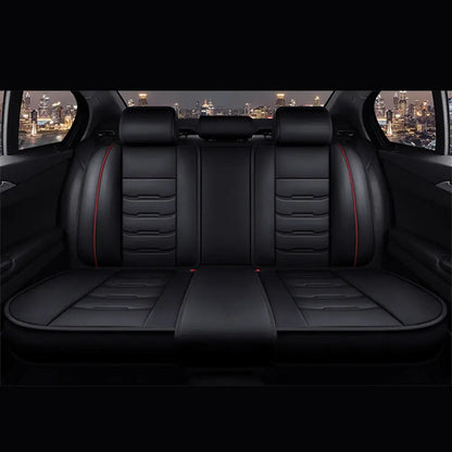 Black Jungle Line universal PU leather car seat cover on front seat, showcasing durable, sleek material and snug fit.