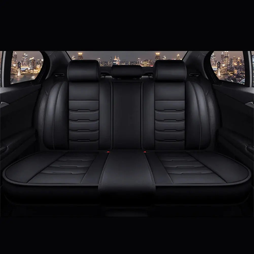 Black Jungle Line universal PU leather car seat cover on front seat, showcasing durable material and secure fit.
