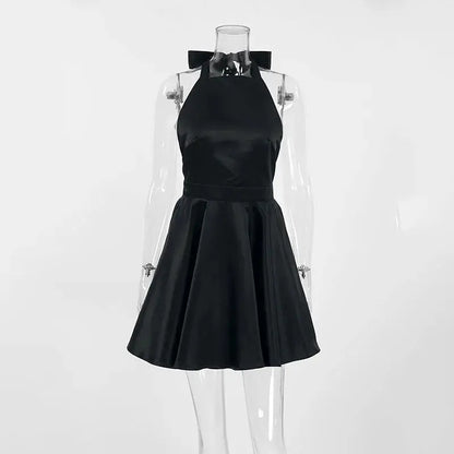 Black Jungle Line backless halter mini dress for women, sleeveless French style short dress with pockets, perfect for evening parties.