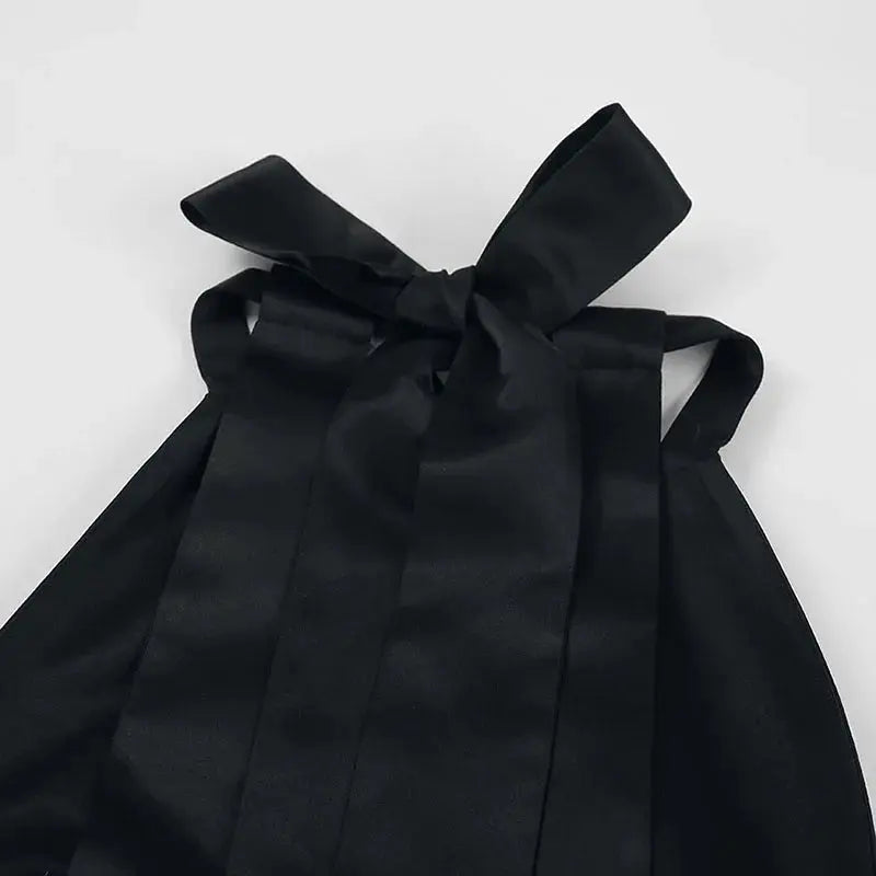 Black Jungle Line backless halter mini dress for women, French style sleeveless short dress with pockets, ideal for evening parties.