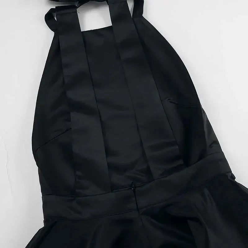 Black Jungle Line backless halter mini dress for women, sleeveless French style evening dress with pockets, perfect for parties.