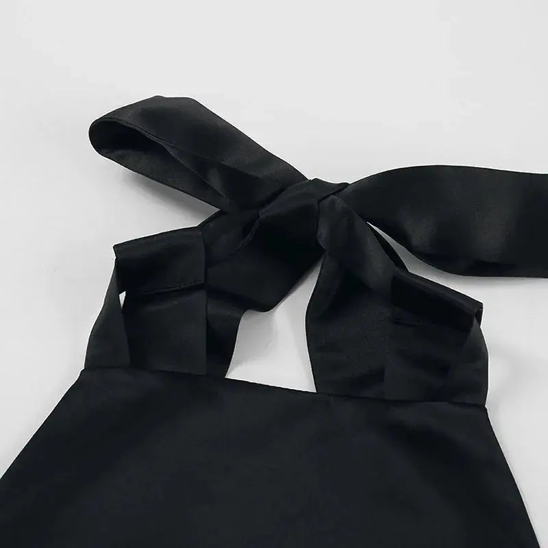 Black Jungle Line backless halter mini dress for women, sleeveless French style evening dress with pockets, perfect for parties.