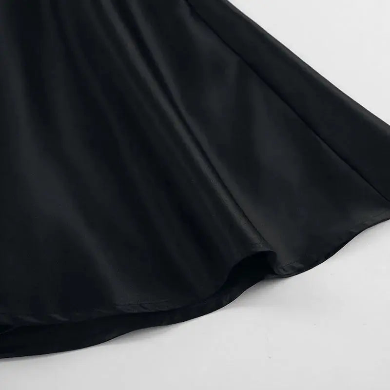 Black Jungle Line backless halter mini dress for women, sleeveless French style with pockets, perfect for evening parties.