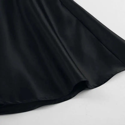 Black Jungle Line backless halter mini dress for women, sleeveless French style with pockets, perfect for evening parties.
