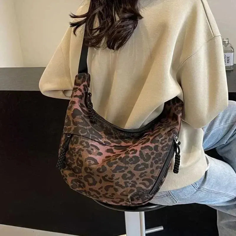Jungle Line leopard print crossbody bag for women in corduroy with brown and black pattern, 36cm x 21cm x 7cm.