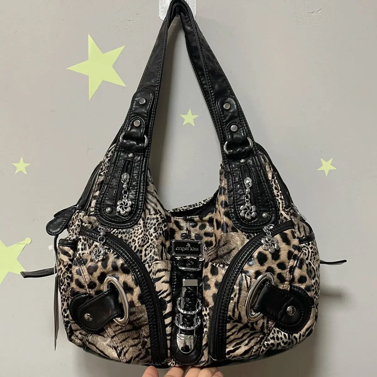 Angelkiss Leopard Shoulder Bag by Jungle Line featuring top-handle design, spacious tote style, and fashionable dumpling shape.