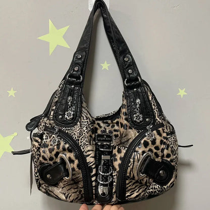 Angelkiss Leopard Shoulder Bag by Jungle Line featuring top-handle design, spacious tote style, and fashionable dumpling shape.
