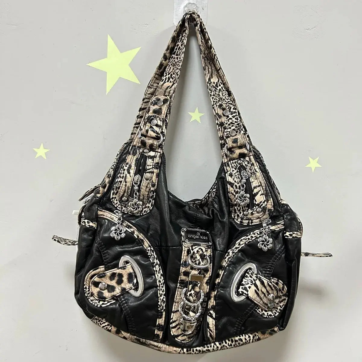Angelkiss Leopard Shoulder Bag by Jungle Line featuring top-handle, satchel style, large tote, and hobo design in brown leather.