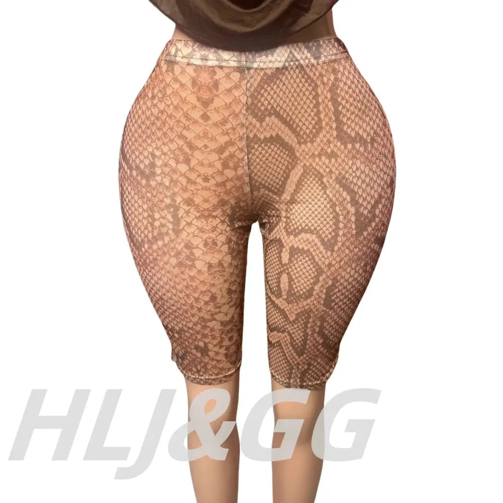 Ensemble deux pièces Jungle Line : haut halter ruched et short léopard, top crop dos nu profond, style streetwear tendance.