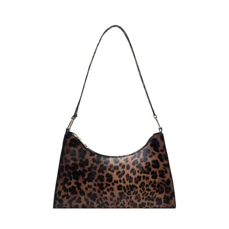 Sac à main pour femmes en cuir PU avec motif zèbre et léopard, de la marque Jungle Line, style tendance et élégant.