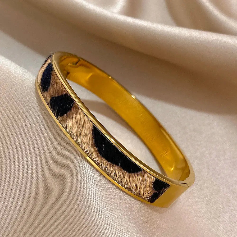 Gold-colored Leopard Print Welt Women's Bracelet by Jungle Line featuring a stylish animal print design