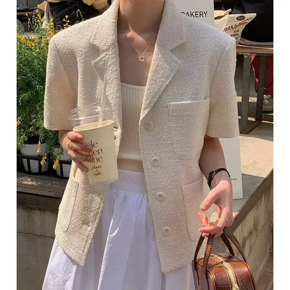 Jungle Line women's Korean style suit jacket with lapel, single-breasted, multiple pockets, short sleeves, loose fit, summer fashion.