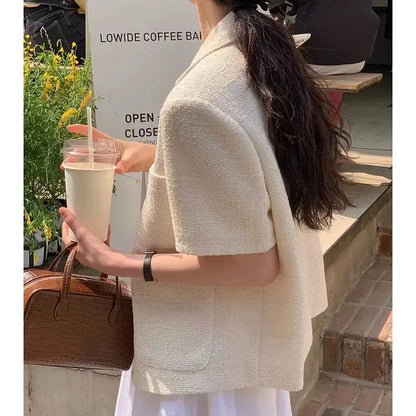 Jungle Line women's Korean style suit jacket with lapel, single-breasted, multiple pockets, short sleeves, loose fit for summer 2025.