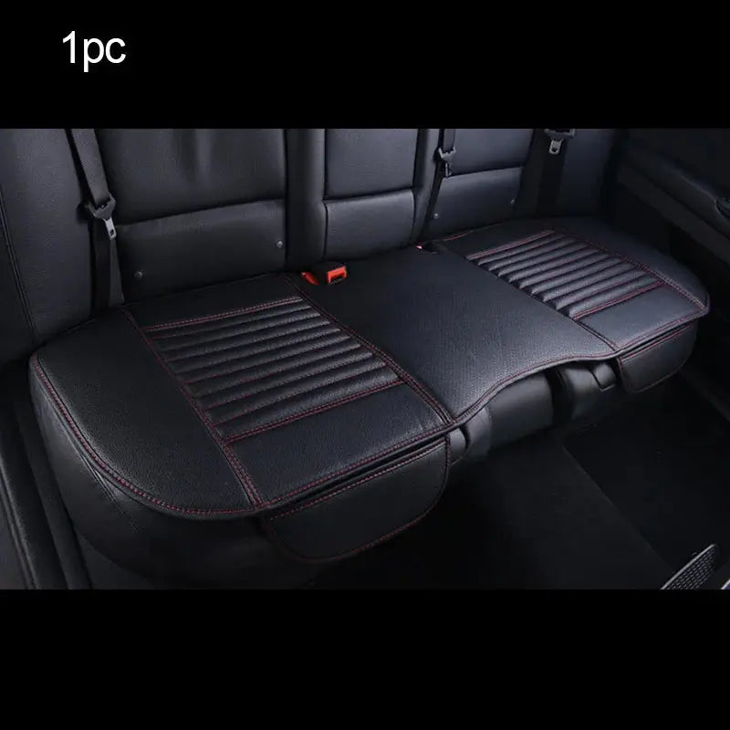 White PU leather car seat cover by Jungle Line, universal fit, shown on front seat of vehicle for protection and style.