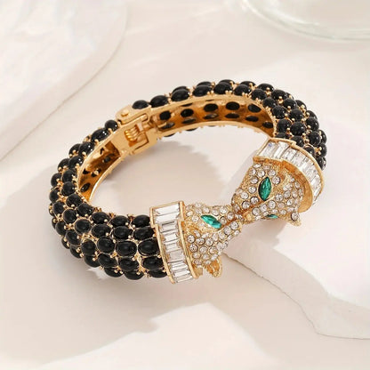 Vintage luxury Jungle Line full rhinestone double-headed leopard brooch with gold color and intricate detailing.