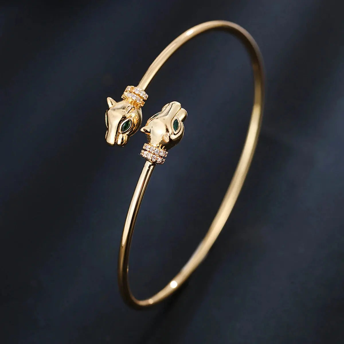 Golden Jungle Line leopard pattern head bracelet for women featuring classic zirconia accents and intricate design.
