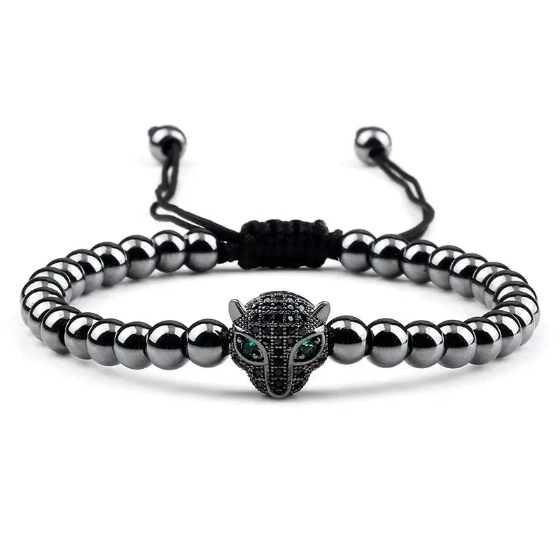 Bracelet Jungle Line avec pendentif tête de léopard en cuivre de 5 mm, perles en cuivre noir, style sauvage et élégant.