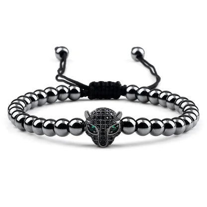 Bracelet Jungle Line avec pendentif tête de léopard en cuivre de 5 mm, perles en cuivre noir, style sauvage et élégant.