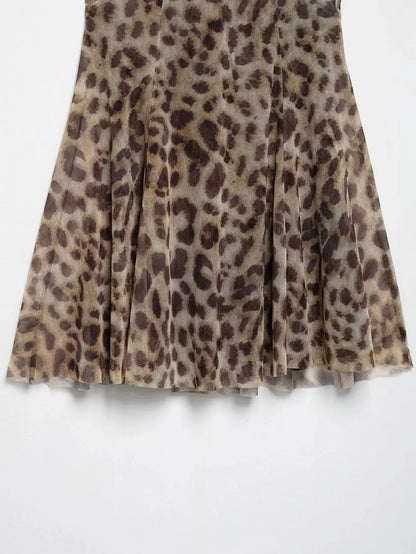 Robe courte femme Jungle Line à imprimé léopard, sans manches, décolleté en V, dos nu, idéale pour l'été et la plage.