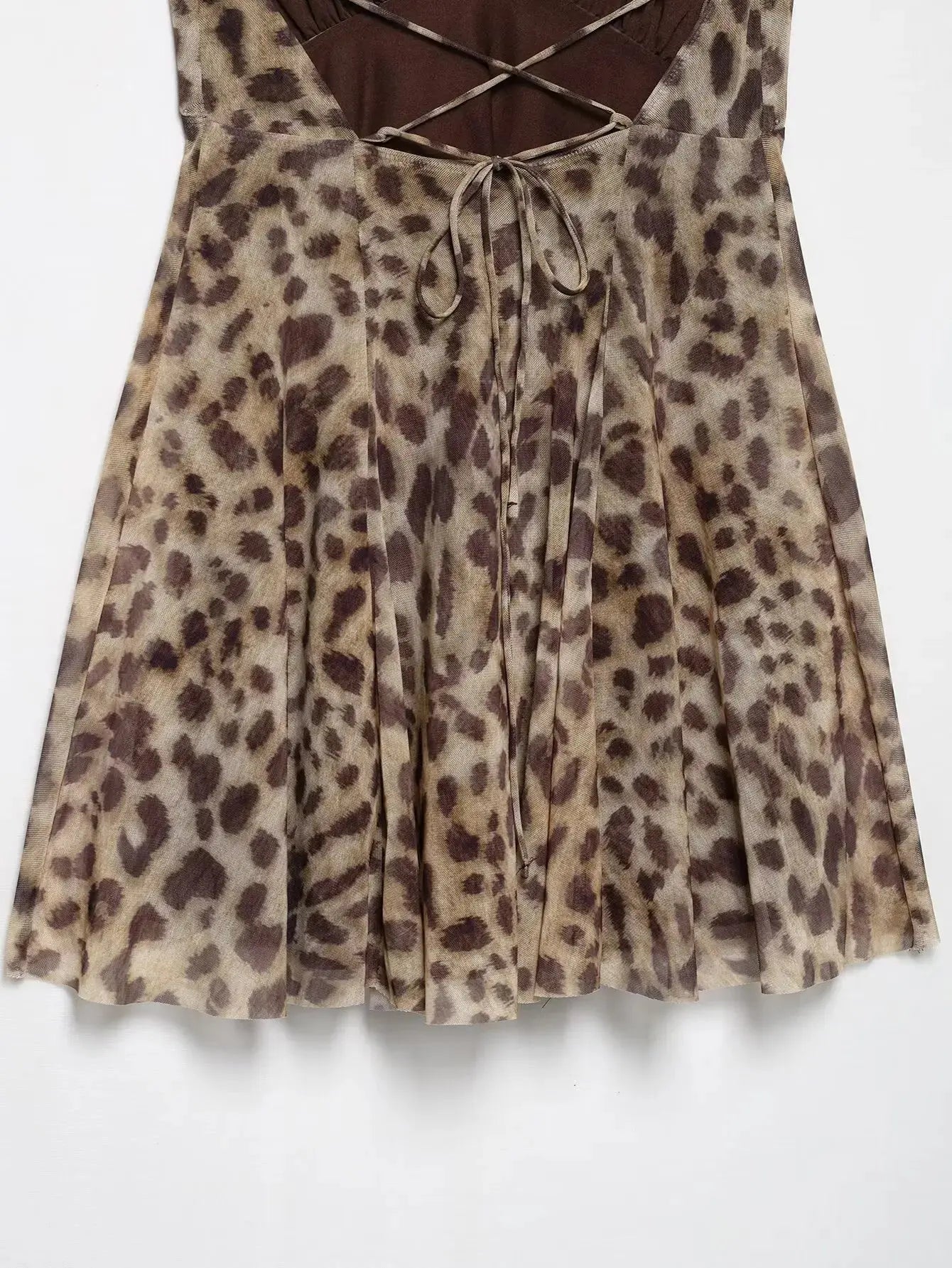 Robe courte femme Jungle Line à imprimé léopard, décolleté en V, dos nu, sans manches, idéale pour l'été et la plage.