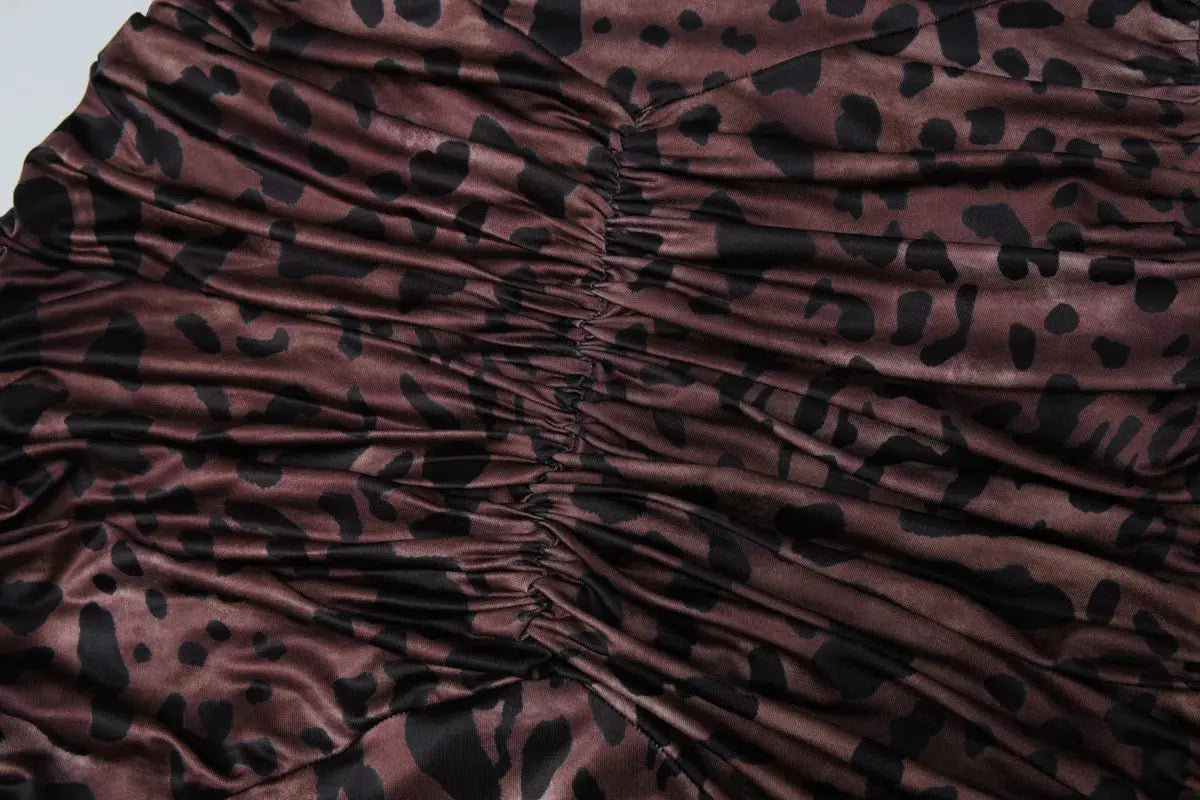 Robe longue sexy à imprimé léopard pour femmes, dos nu, halter, décolleté en V profond, sans manches, style bodycon, élégante soirée.