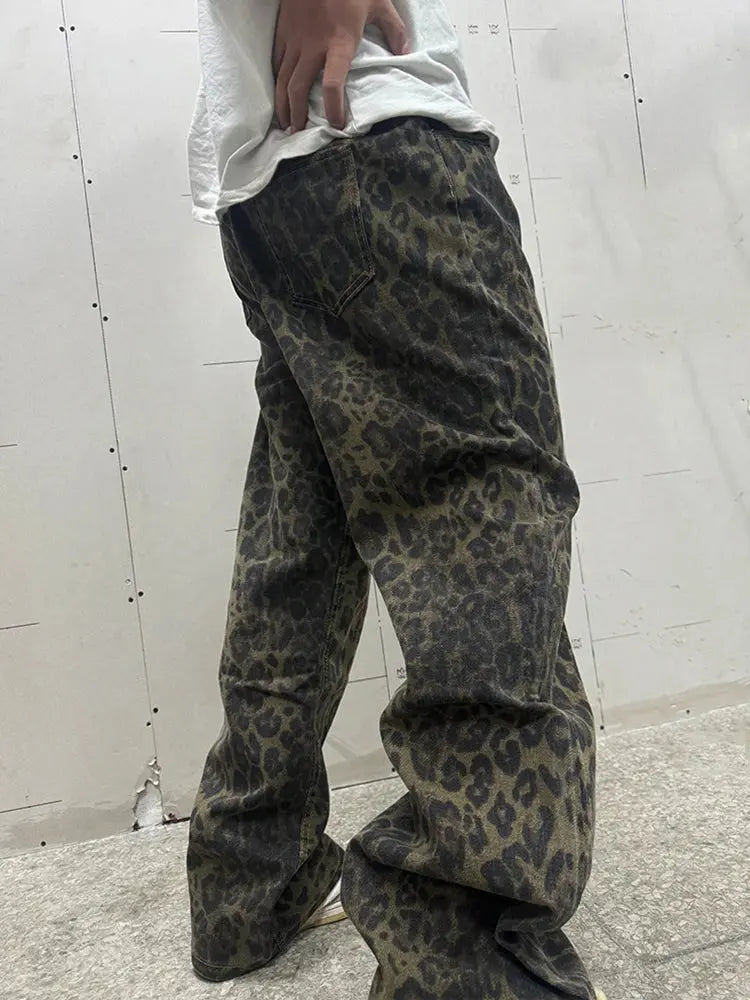 Loose straight leopard print jeans for men by Jungle Line, casual wide-leg denim trousers with a hip-hop streetwear style.