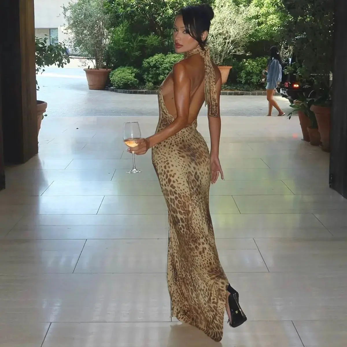Jungle Line leopard print halter backless maxi dress for women, bandage style with embellishments, perfect for club or party wear.