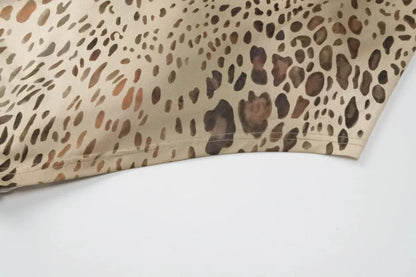Jungle Line leopard print halter backless maxi dress with bandage embellishments, perfect for club wear and stylish evening looks.