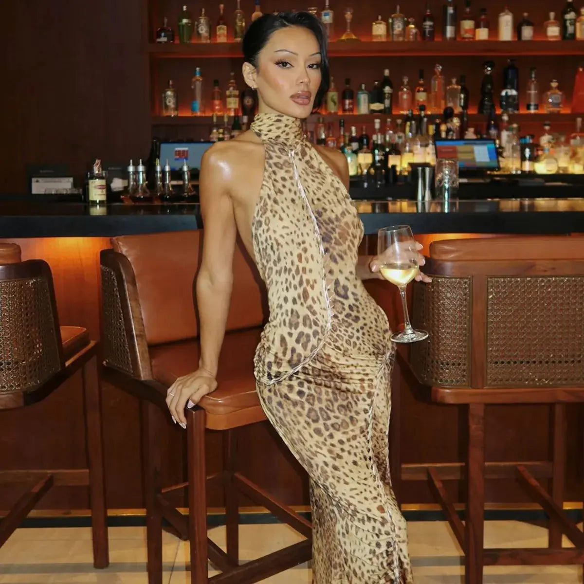 Jungle Line leopard halter backless maxi dress for women, bandage style with embellishments, perfect for clubwear and evening events.