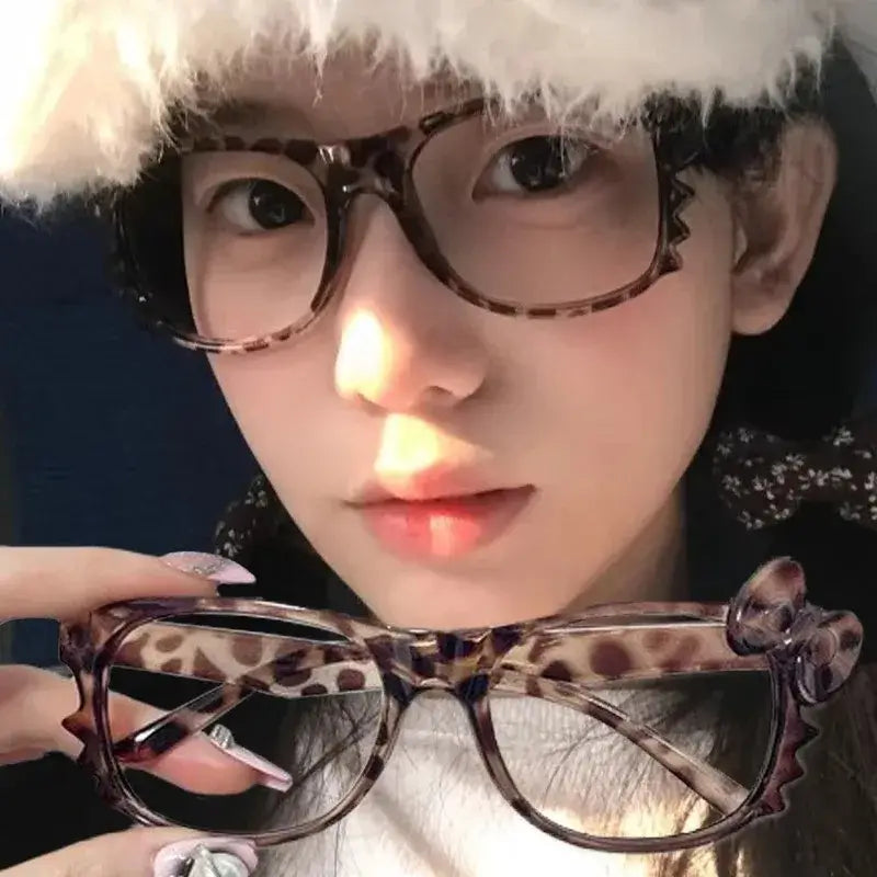 Lunettes vintage pour femmes Jungle Line avec imprimé léopard, grand cadre ovale, nœud bow, style Y2K, sans lentilles.