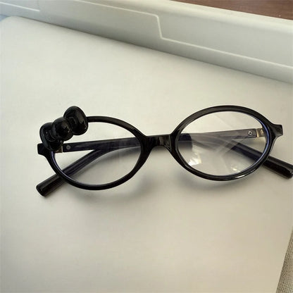 Lunettes vintage pour femmes Jungle Line, monture ovale large à imprimé léopard, nues, style Y2K, avec nœud et motif cartoon.