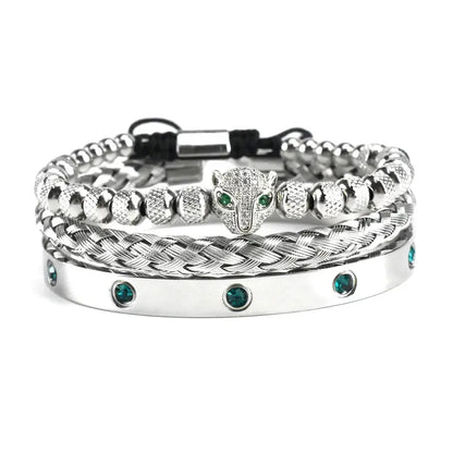 Handmade luxury green eye leopard head charm from Jungle Line, showcasing intricate design and vibrant colors.