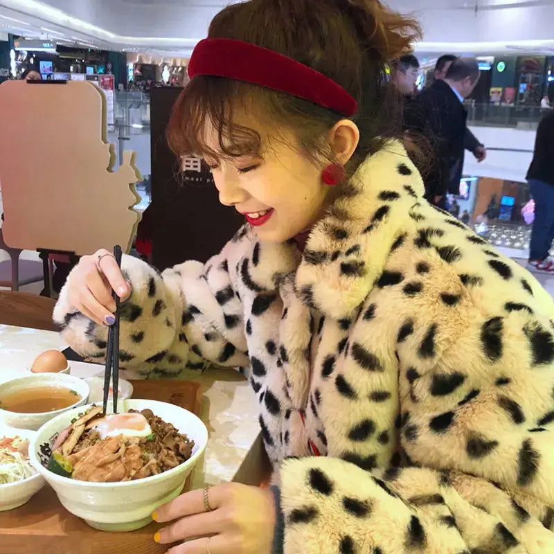 Off-white leopard print imitation fur coat for women, winter style by Jungle Line, featuring a cozy, integrated fur design.