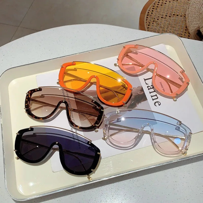 Lunettes de soleil oversize Jungle Line pour femmes et hommes, design en métal luxe, motif léopard orange, verres dégradés pour sports extérieurs.