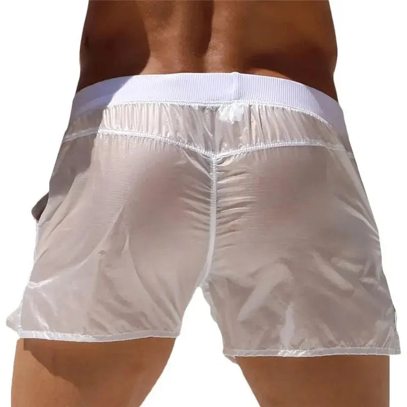Pink men's summer swim shorts by Jungle Line, featuring a comfortable fit and quick-drying fabric for beach and pool use.